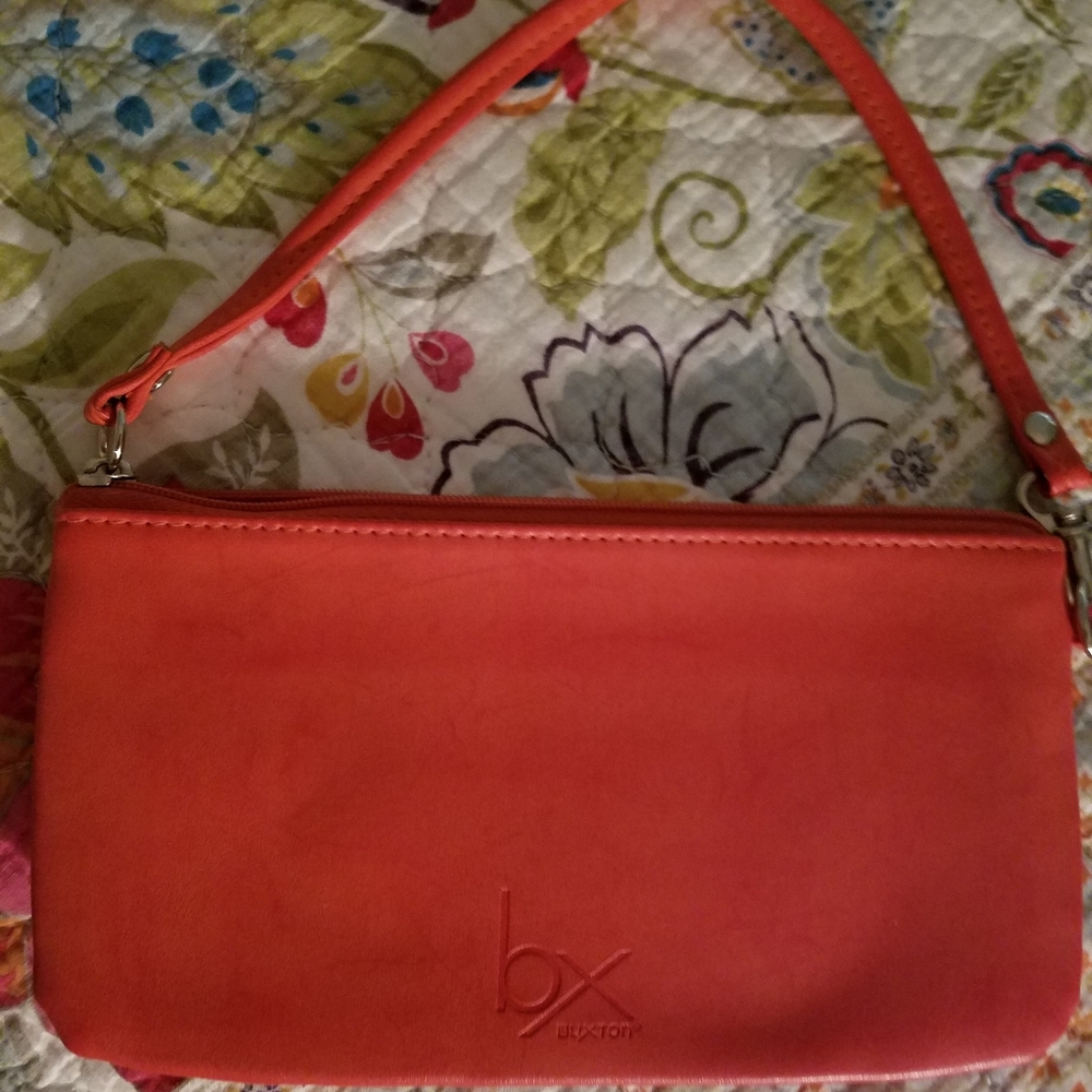 Buxton orange wristlet